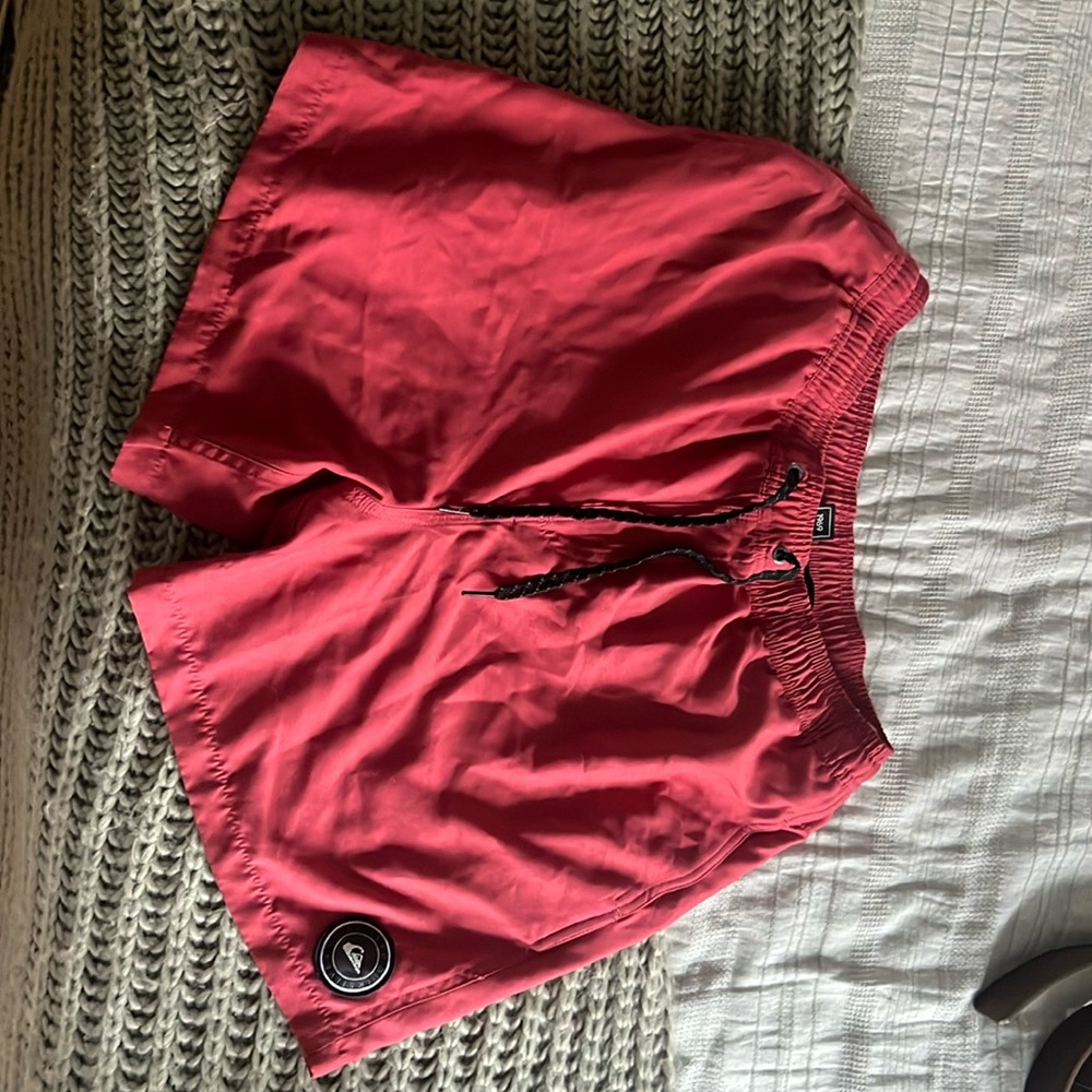 Quiksilver bathing suit. Worn once. Lifeguard red